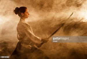 Young woman with samurai sword
